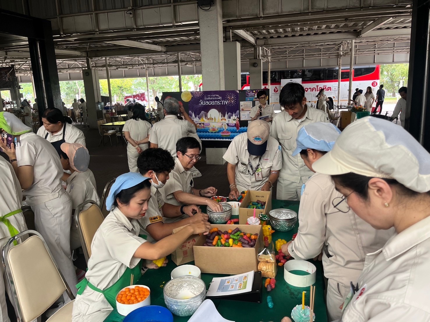 executives-and-employees-collaboratively-craft-krathongs